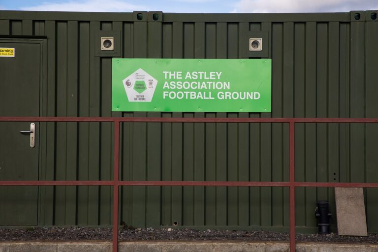 Astleys Association Football Grounds changing rooms with the sign for the football ground on show.